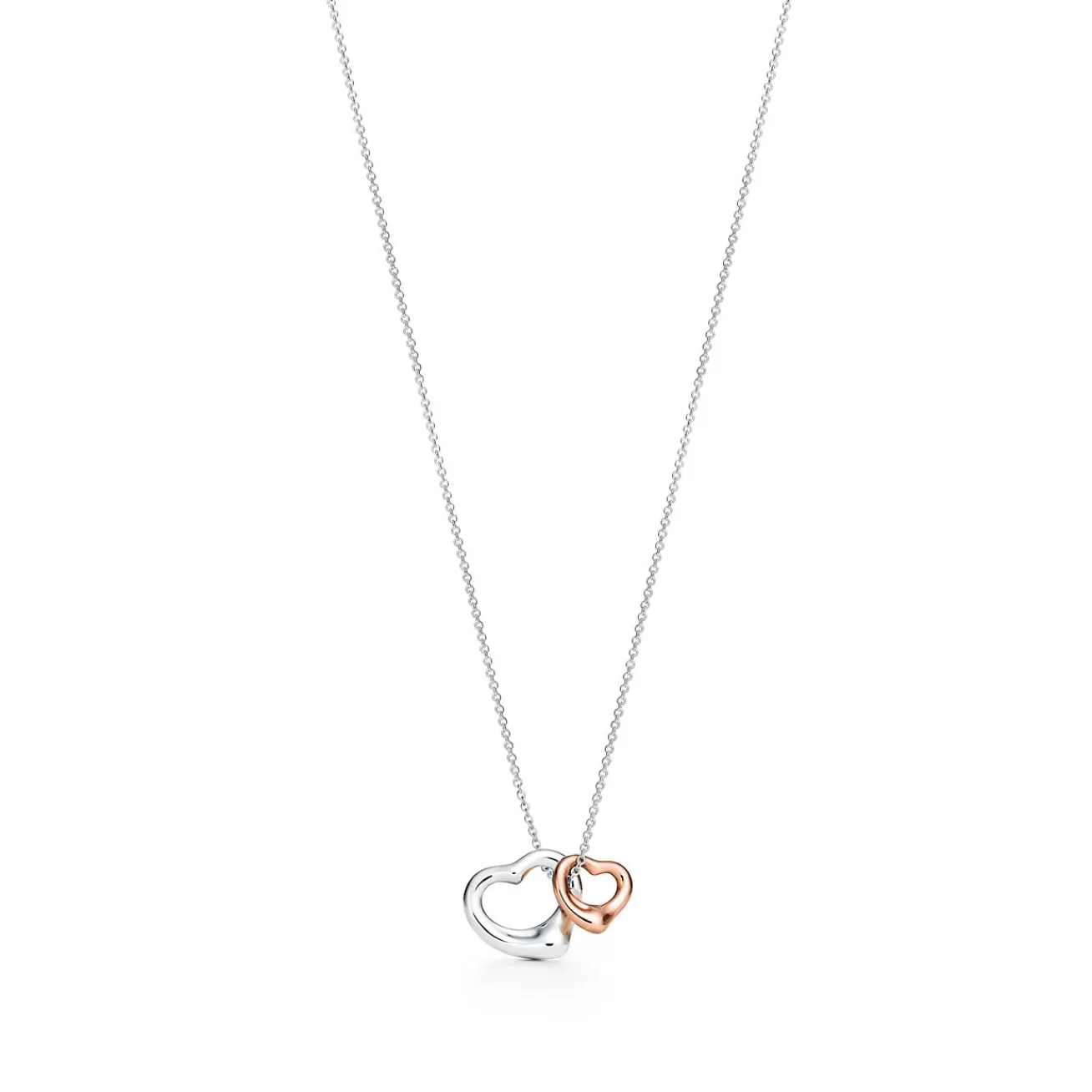 Tiffany & Co. Elsa Peretti® Open Heart pendant in silver and 18k rose gold, extra mini. | ^ Necklaces & Pendants | Gifts for Her