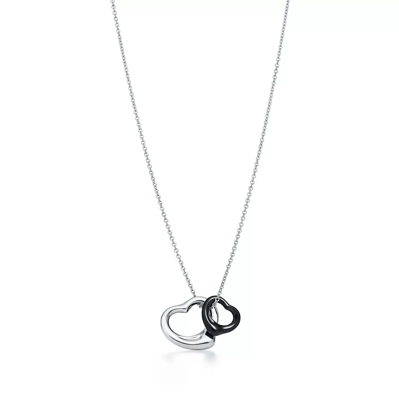Tiffany & Co. Elsa Peretti® Open Heart pendant in sterling silver and black jade. | ^ Necklaces & Pendants | Sterling Silver Jewelry
