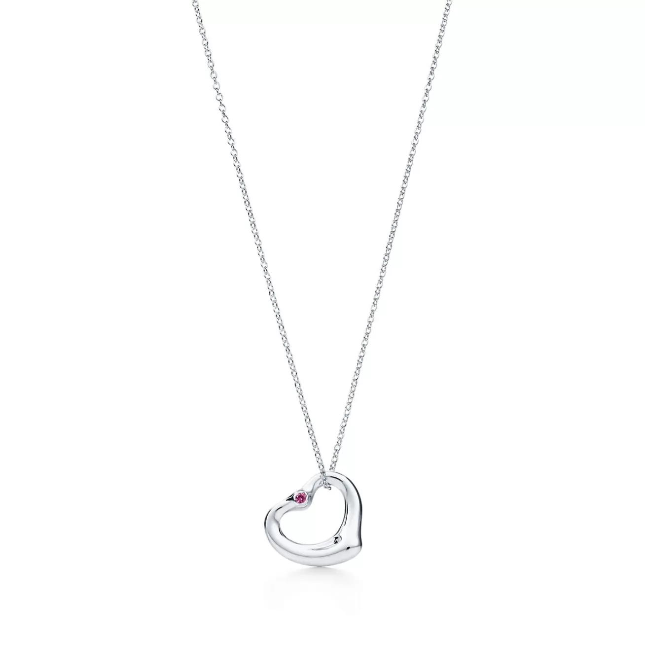 Tiffany & Co. Elsa Peretti® Open Heart pendant in sterling silver with a pink sapphire. | ^ Necklaces & Pendants | Sterling Silver Jewelry