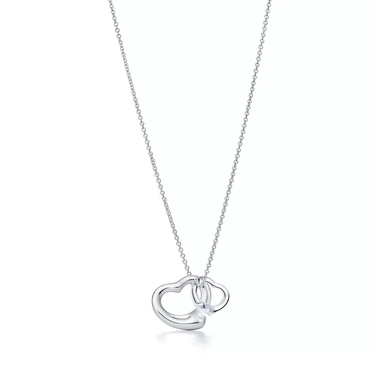 Tiffany & Co. Elsa Peretti® Open Heart pendant of sterling silver and rock crystal. | ^ Necklaces & Pendants | Gifts for Her