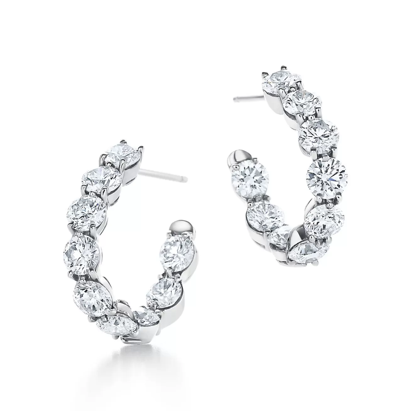 Tiffany & Co. Inside-out hoop earrings in platinum with diamonds. | ^ Earrings | Hoop Earrings