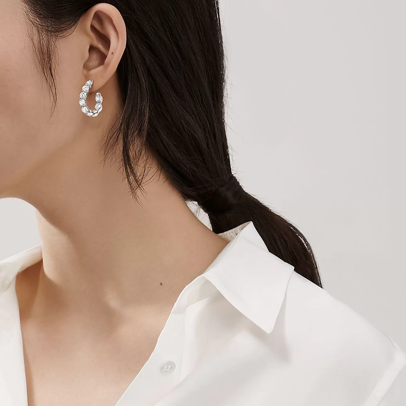 Tiffany & Co. Inside-out hoop earrings in platinum with diamonds. | ^ Earrings | Hoop Earrings
