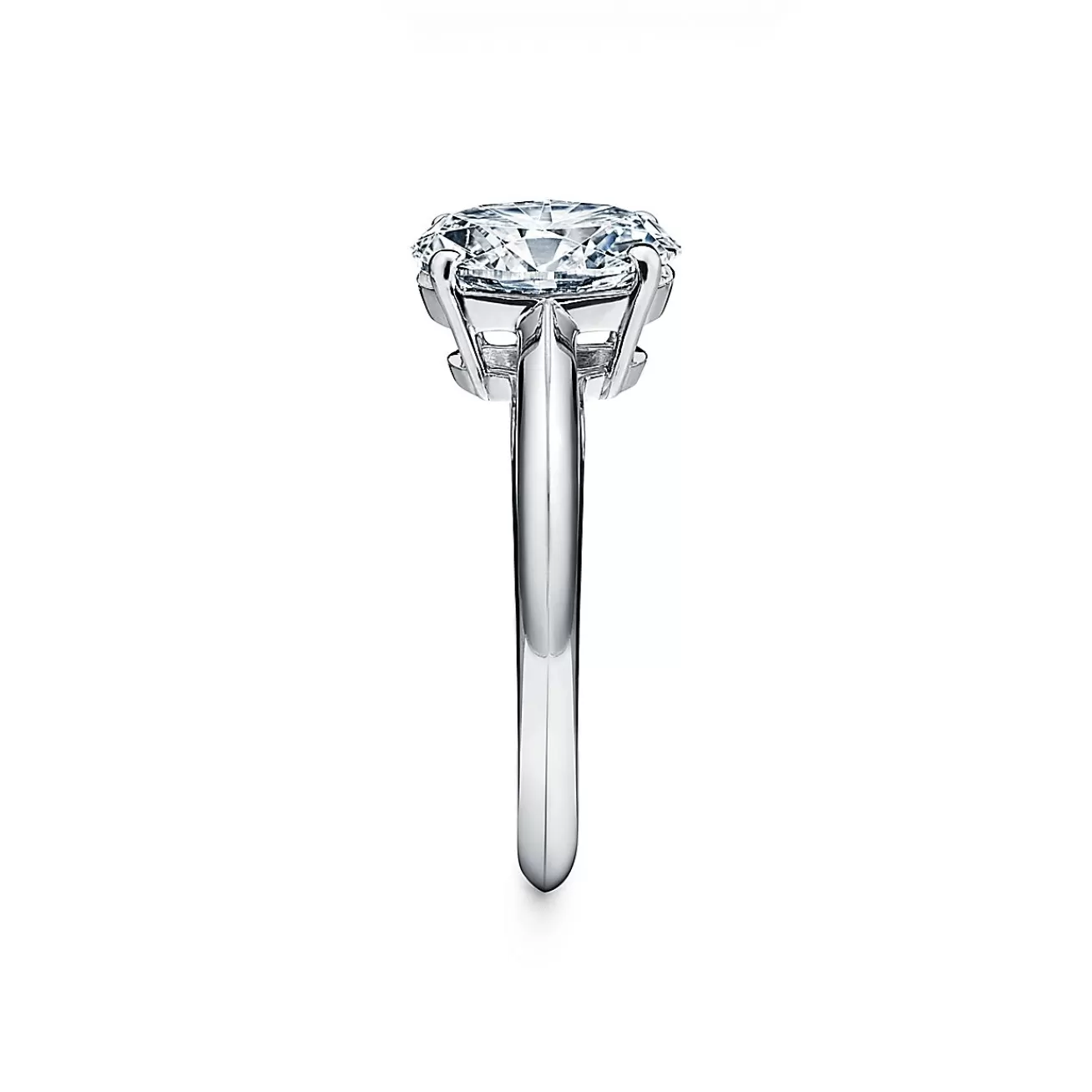 Tiffany & Co. Oval-cut diamond engagement ring in platinum. | ^ Engagement Rings