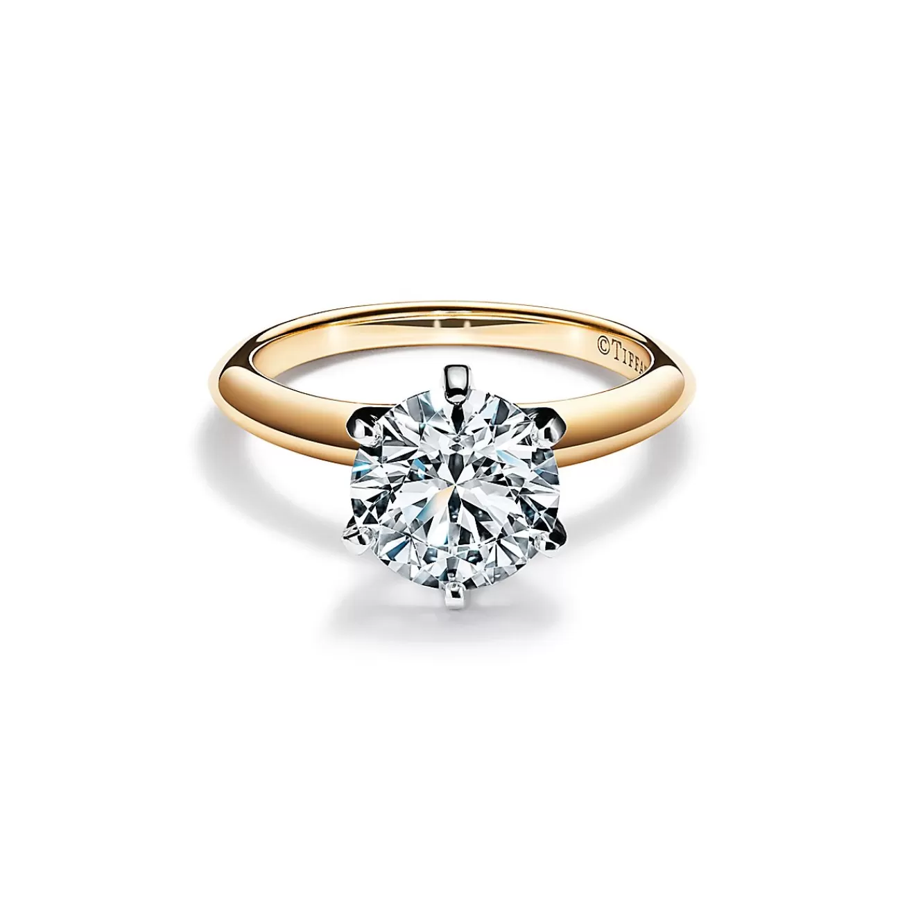 Tiffany & Co. The Tiffany® Setting in 18k yellow gold: world's most iconic engagement ring. | ^ Engagement Rings