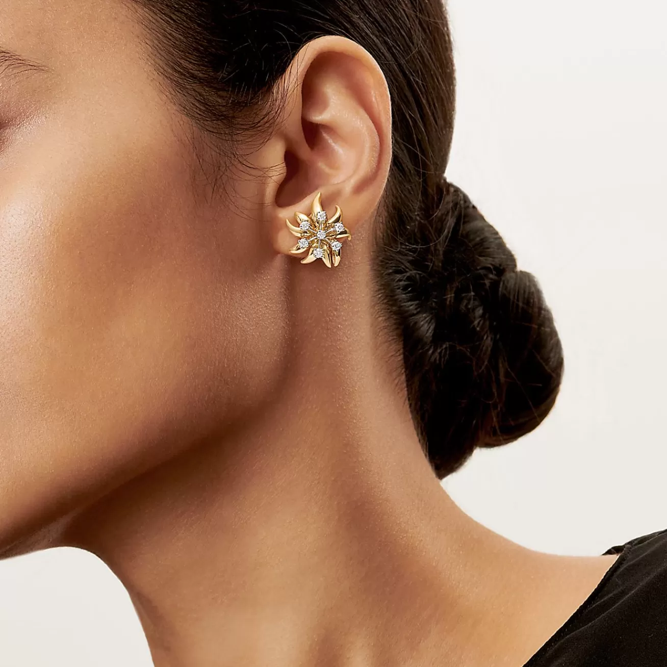 Tiffany & Co. Schlumberger® Flame ear clips in 18k gold with diamonds. | ^ Earrings | Gold Jewelry