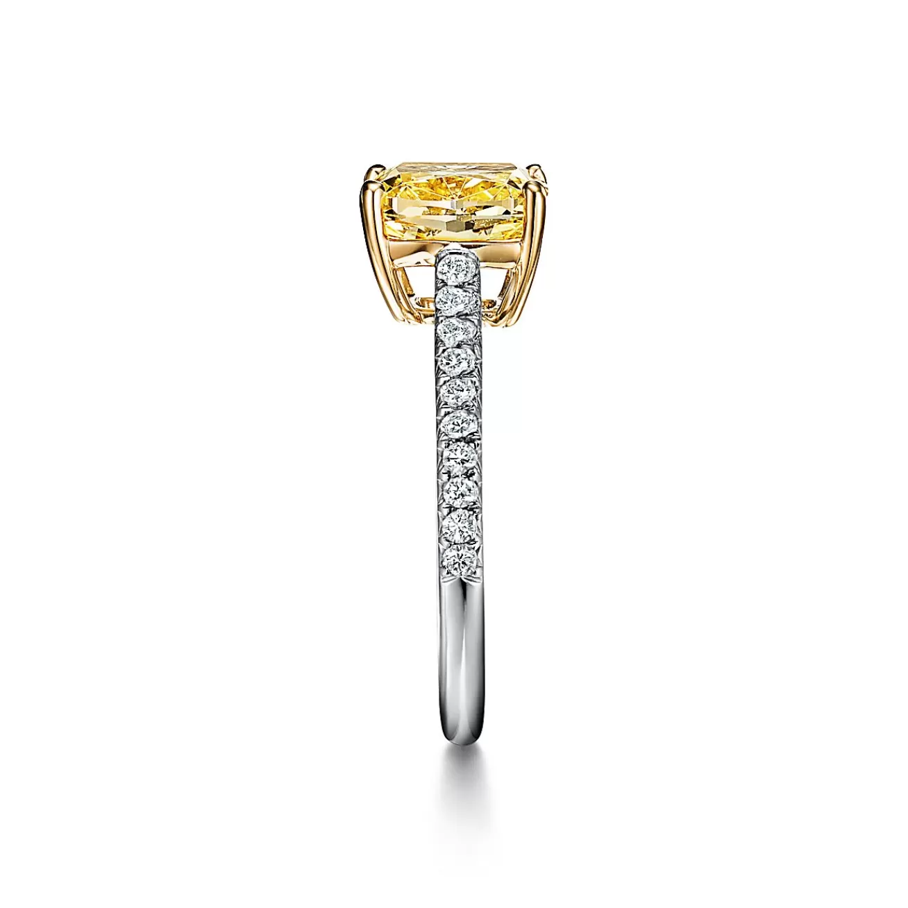 Tiffany & Co. Tiffany Novo® yellow diamond engagement ring with a pavé diamond platinum band. | ^ Engagement Rings