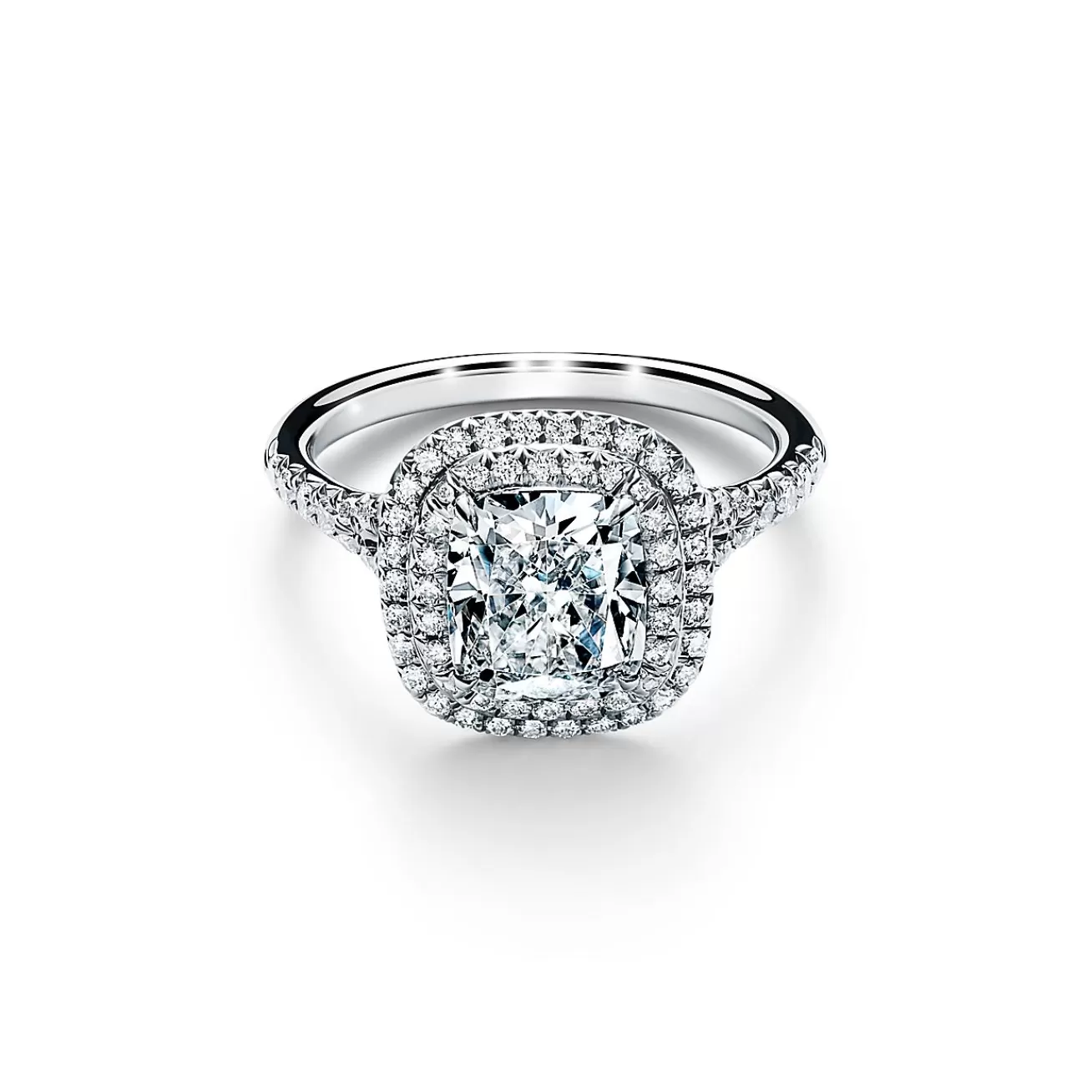 Tiffany & Co. Tiffany Soleste® cushion-cut engagement ring with a diamond band in platinum. | ^ Engagement Rings