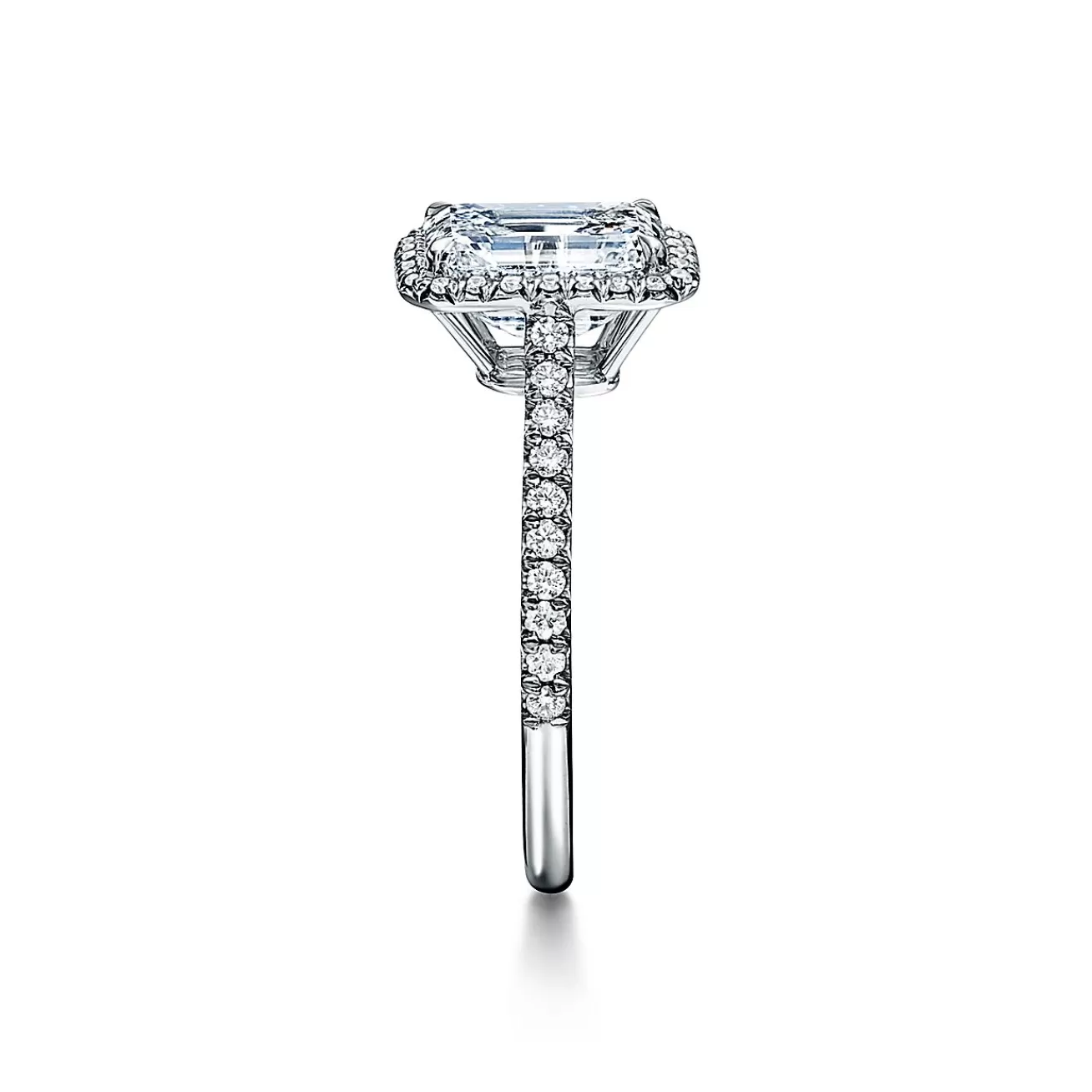 Tiffany & Co. Tiffany Soleste® emerald-cut halo engagement ring with a diamond platinum band. | ^ Engagement Rings