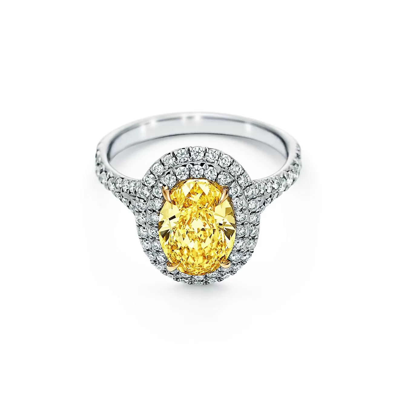 Tiffany & Co. Tiffany Soleste® oval yellow diamond double halo engagement ring in platinum. | ^ Engagement Rings