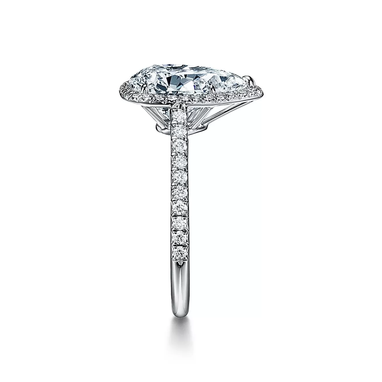 Tiffany & Co. Tiffany Soleste® pear-shaped halo engagement ring with a diamond platinum band. | ^ Engagement Rings