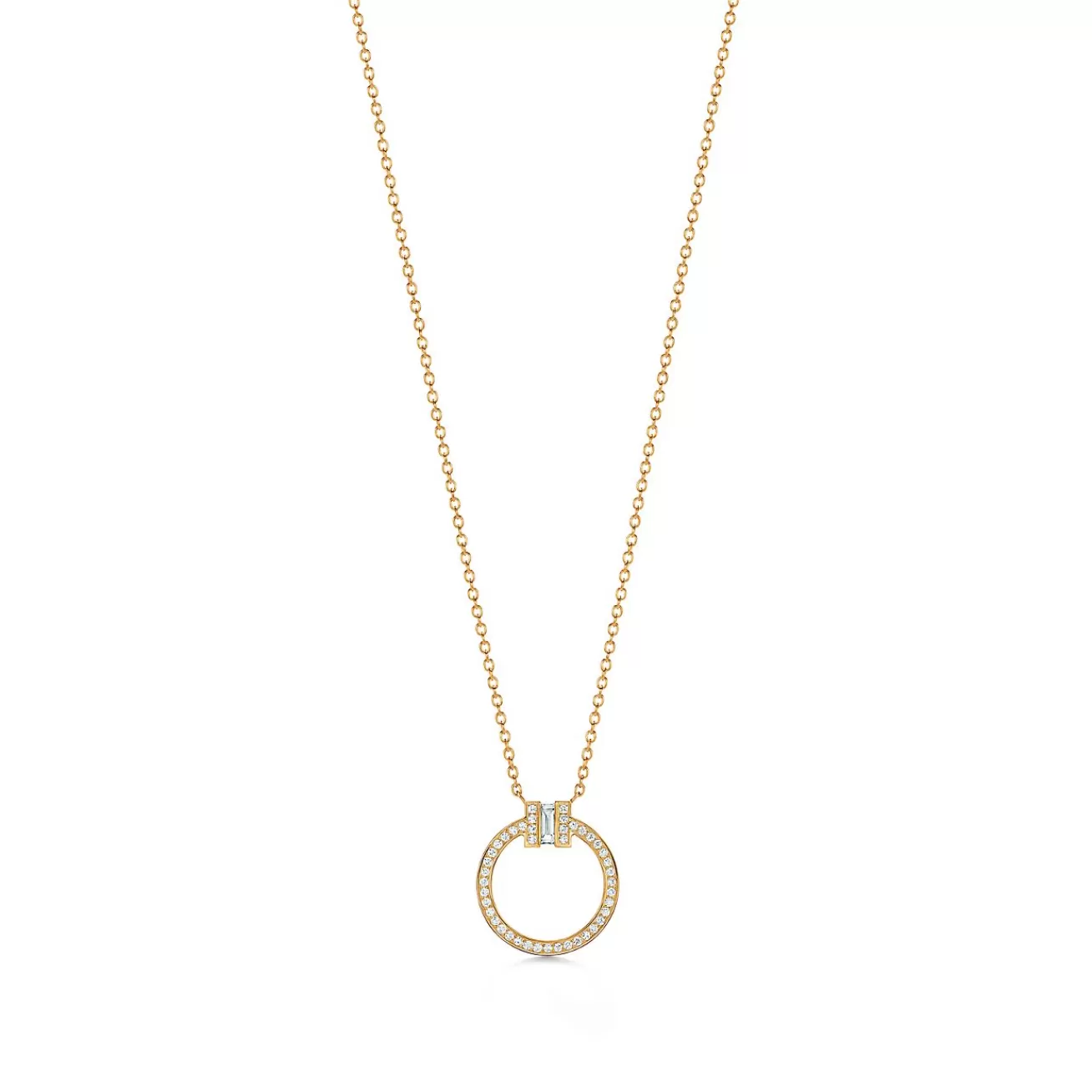 Tiffany & Co. Tiffany T diamond pendant in 18k gold with a baguette diamond. | ^ Necklaces & Pendants | Gold Jewelry