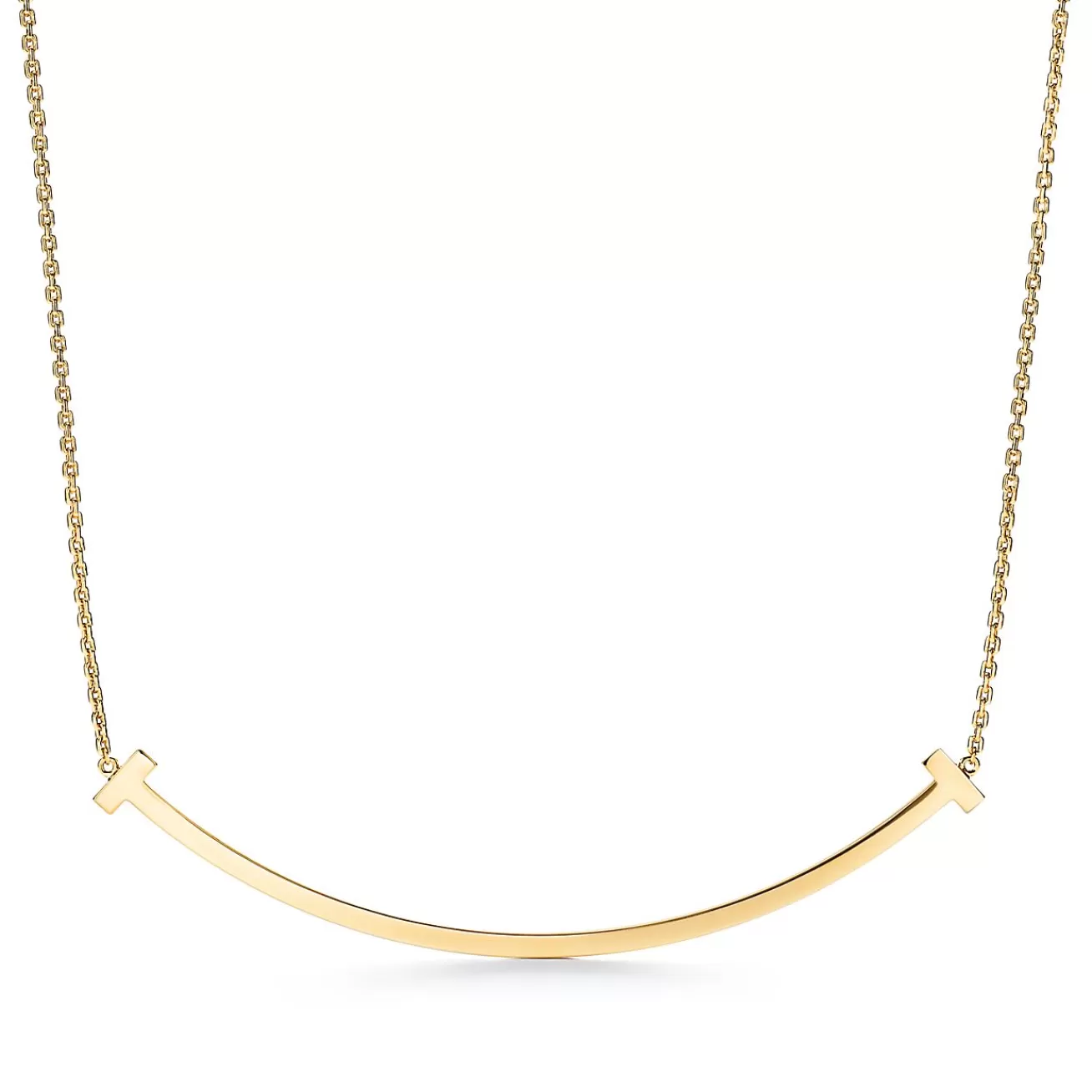 Tiffany & Co. Tiffany T extra large smile pendant in 18k gold. | ^ Necklaces & Pendants | Men's Jewelry