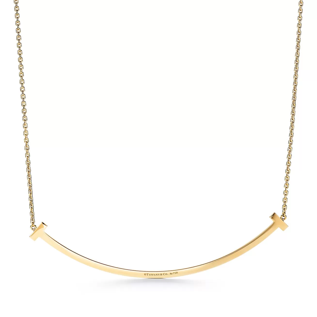 Tiffany & Co. Tiffany T extra large smile pendant in 18k gold. | ^ Necklaces & Pendants | Men's Jewelry