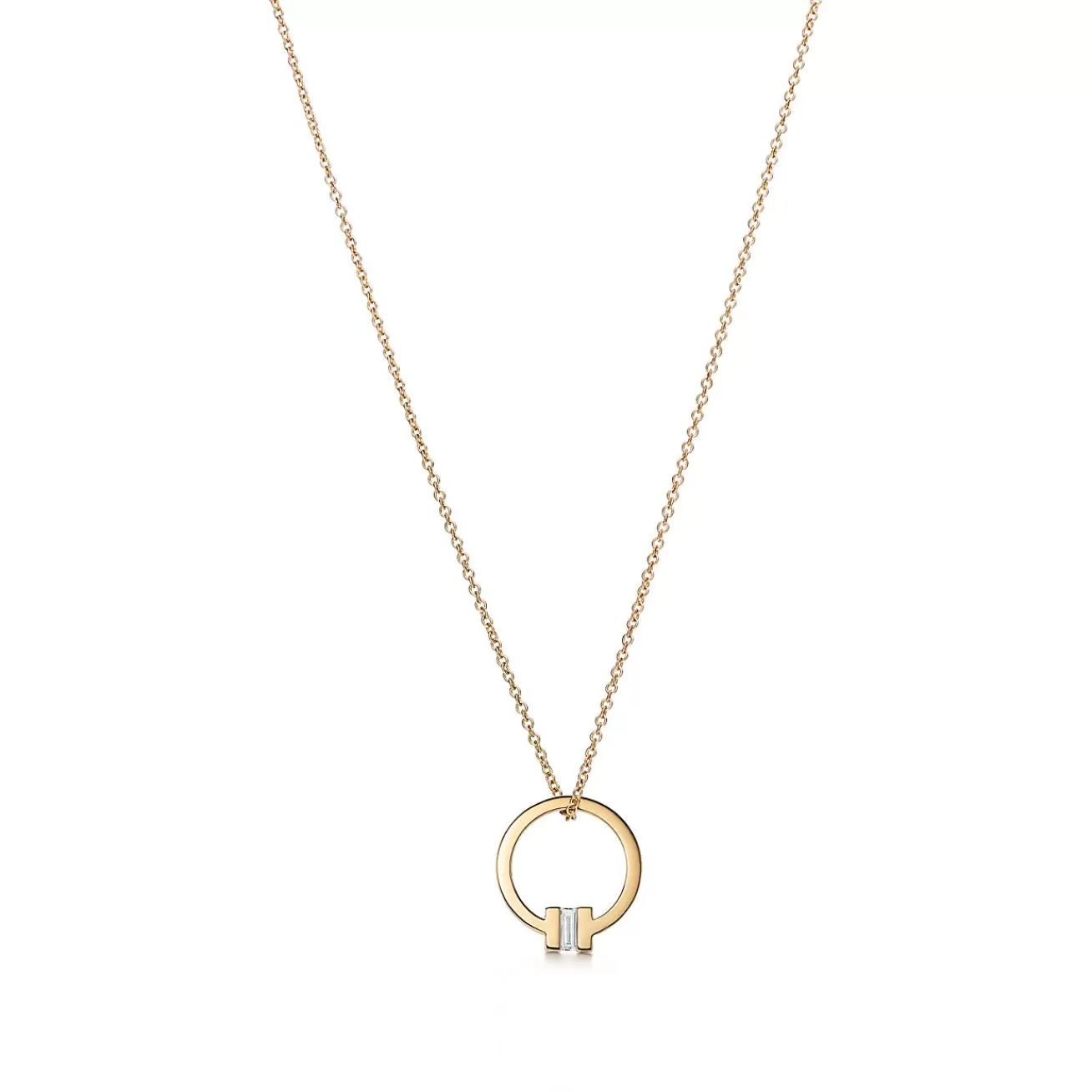 Tiffany & Co. Tiffany T pendant in 18k gold with a baguette diamond. | ^ Necklaces & Pendants | Men's Jewelry