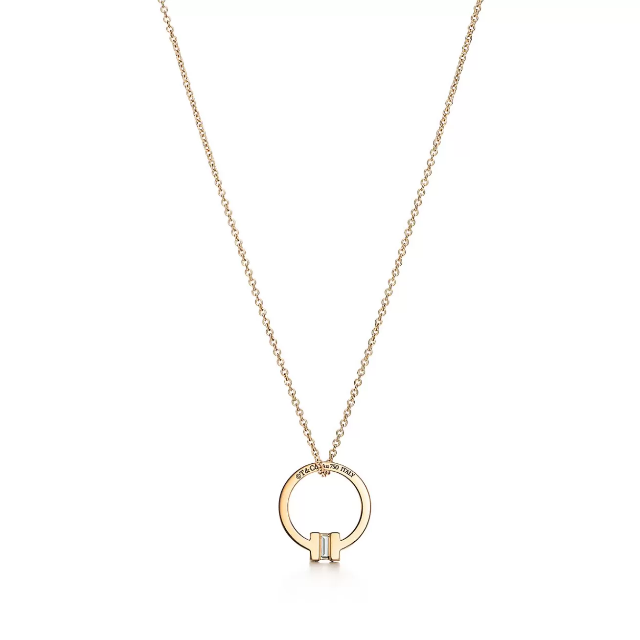 Tiffany & Co. Tiffany T pendant in 18k gold with a baguette diamond. | ^ Necklaces & Pendants | Men's Jewelry