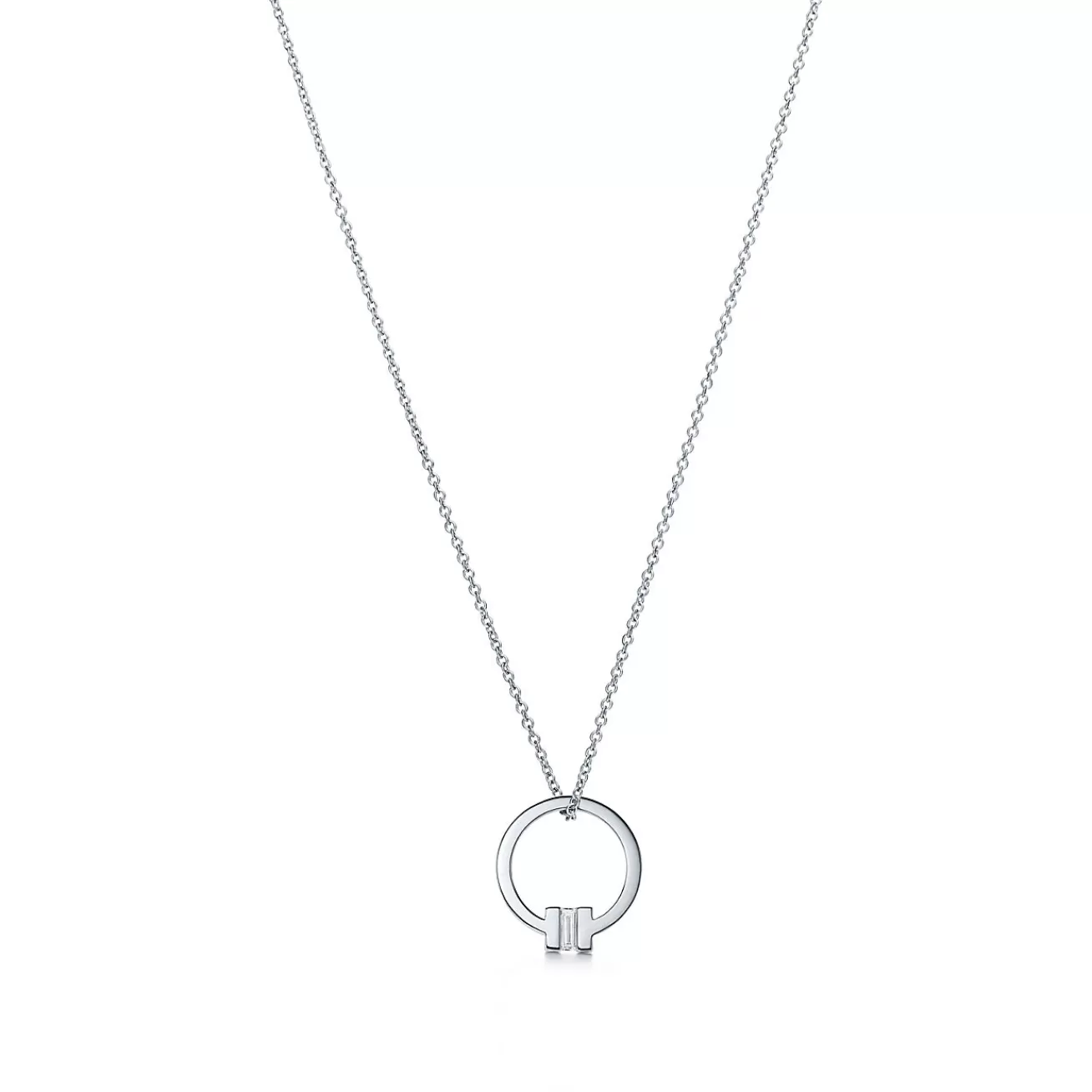Tiffany & Co. Tiffany T pendant in 18k white gold with a baguette diamond. | ^ Necklaces & Pendants | Men's Jewelry