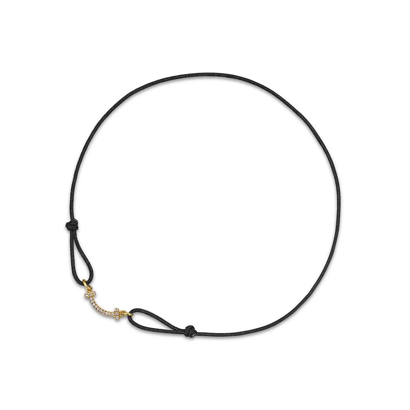 Tiffany & Co. Tiffany T Smile Bracelet in Yellow Gold on a Black Cord with Diamonds | ^ Bracelets | Gifts for Her