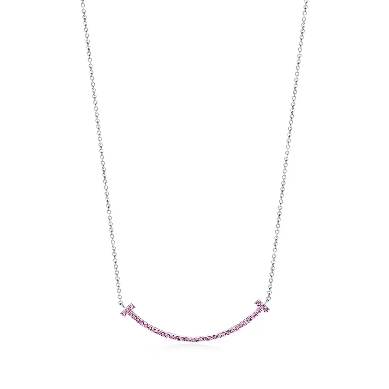 Tiffany & Co. Tiffany T smile pendant in 18k white gold with pink sapphires, small. | ^ Necklaces & Pendants | Colored Gemstone Jewelry