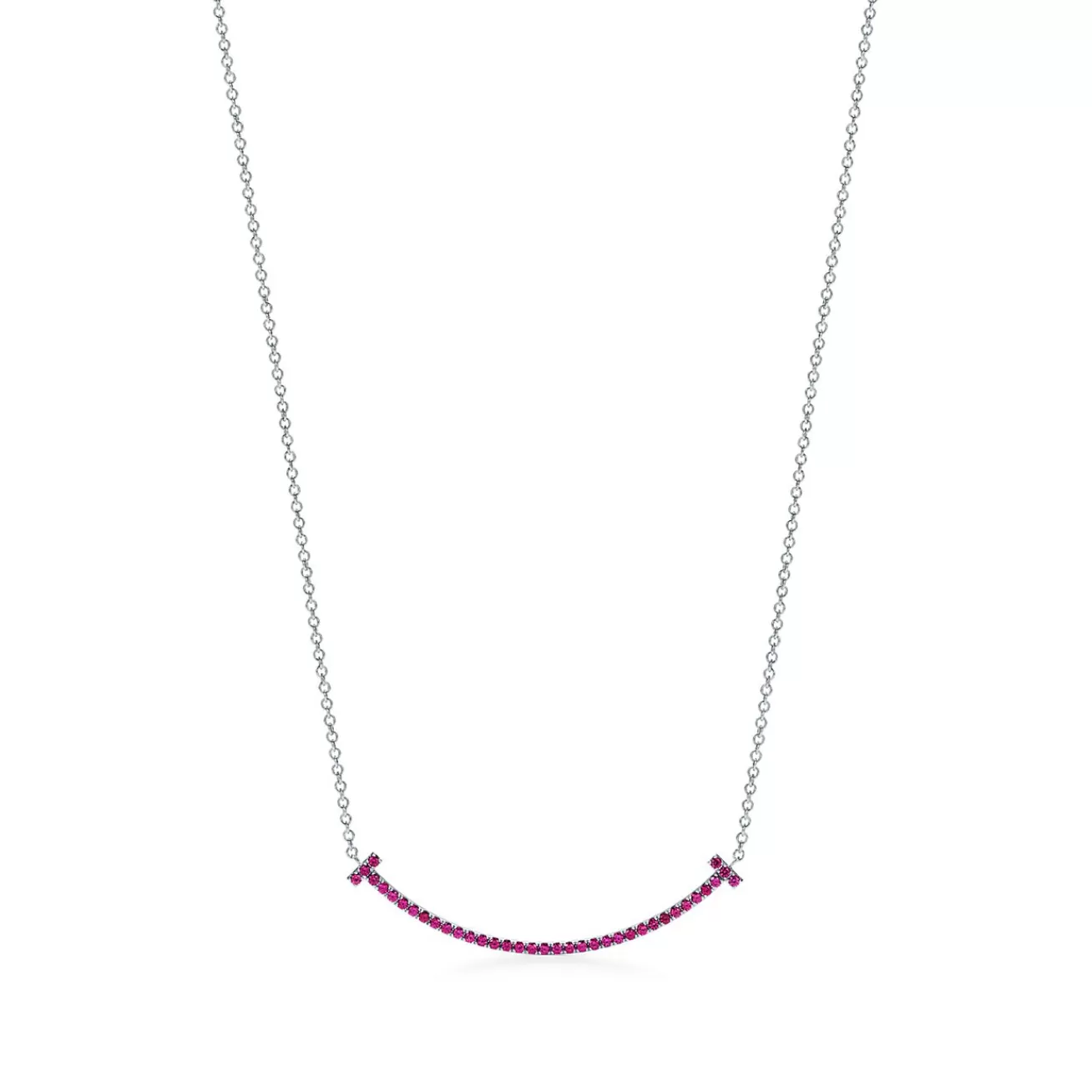 Tiffany & Co. Tiffany T smile pendant in 18k white gold with rubies, small. | ^ Necklaces & Pendants | Colored Gemstone Jewelry