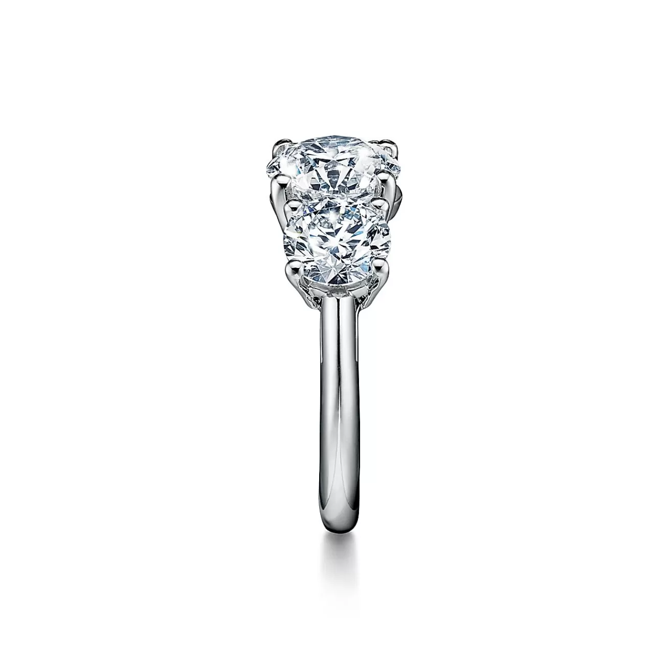 Tiffany & Co. Tiffany Three Stone engagement ring in platinum: an expression of eternal love. | ^ Engagement Rings