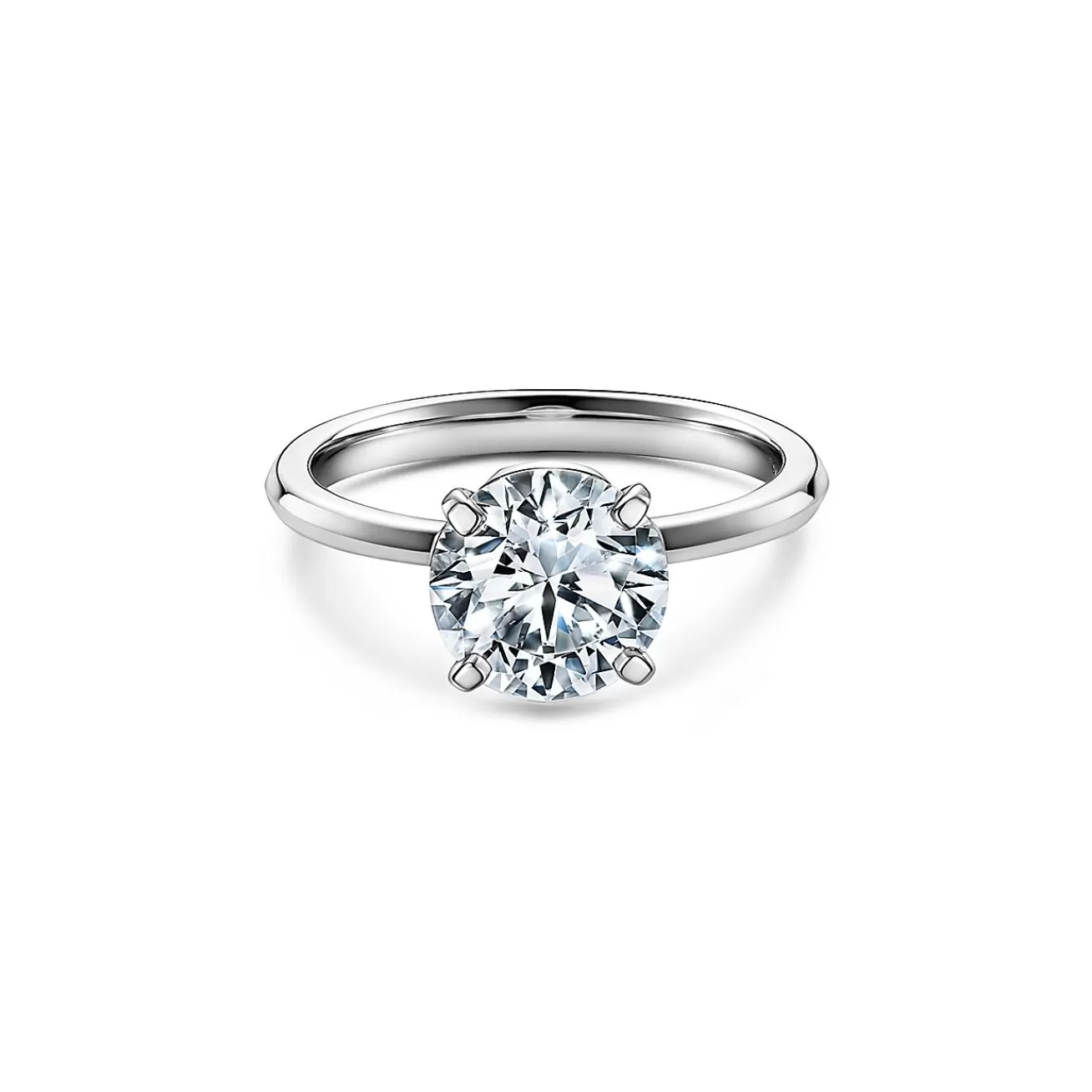 Tiffany & Co. Tiffany True® round brilliant engagement ring: an icon of modern love. | ^ Engagement Rings