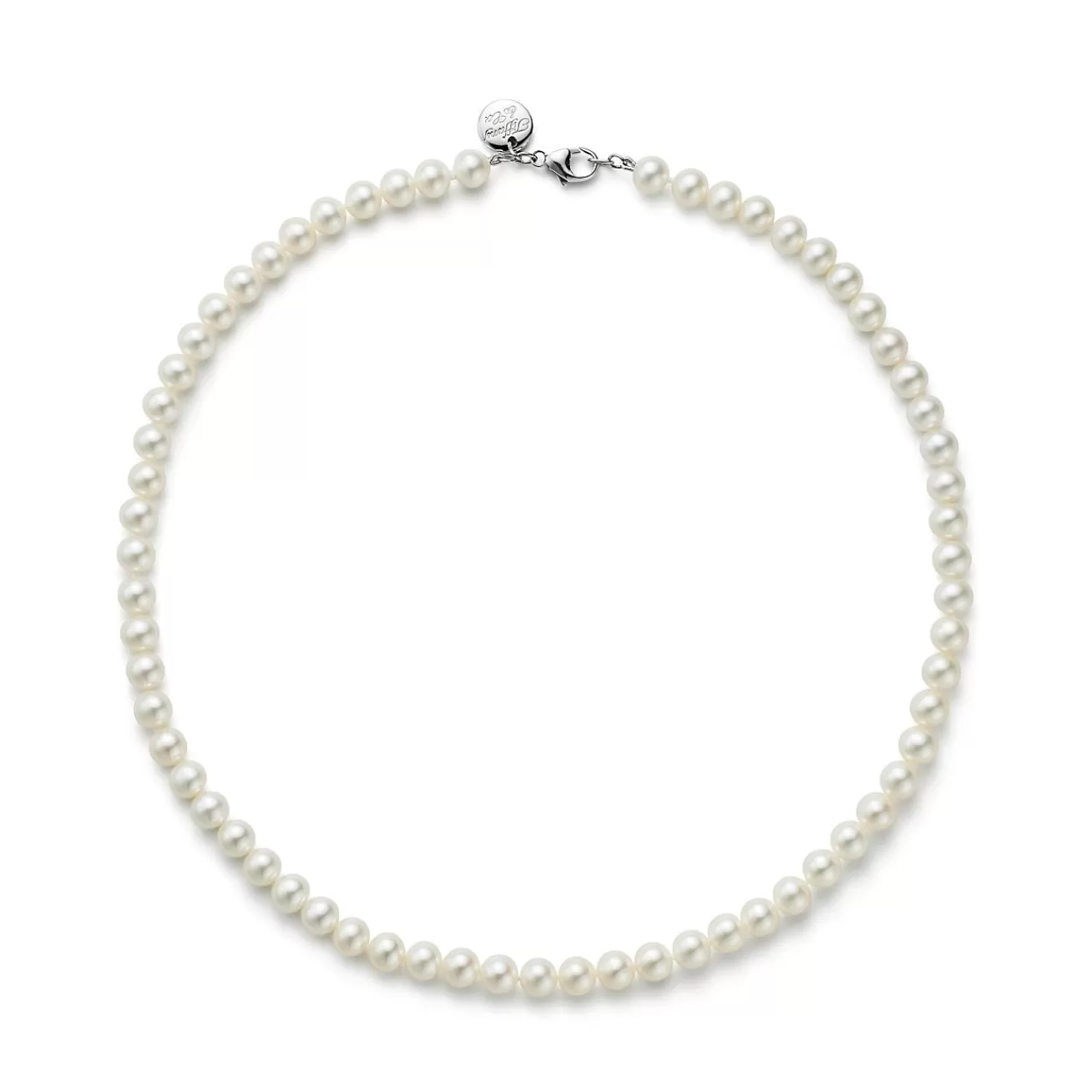 Tiffany & Co. Ziegfeld Collection pearl necklace with a silver clasp and decorative tag, 8-9 mm. | ^ Necklaces & Pendants